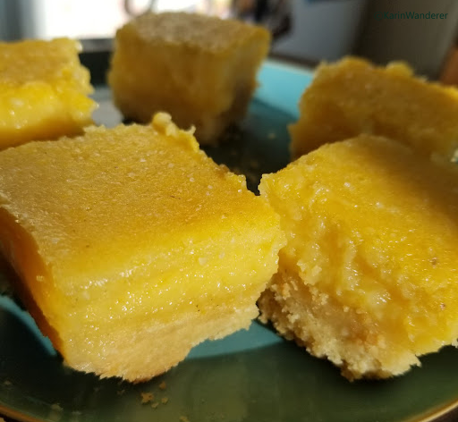 Close-up photo of a plate of delicious lemon curd on a pastry crust.