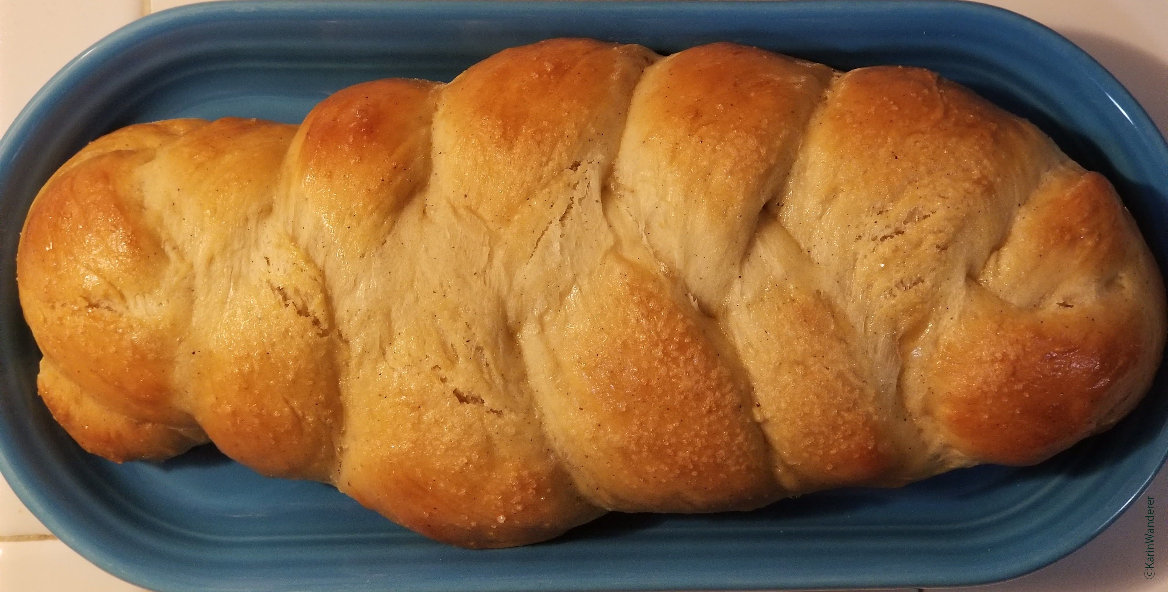 Braided loaf of bulle baked golden brown & ready to eat.