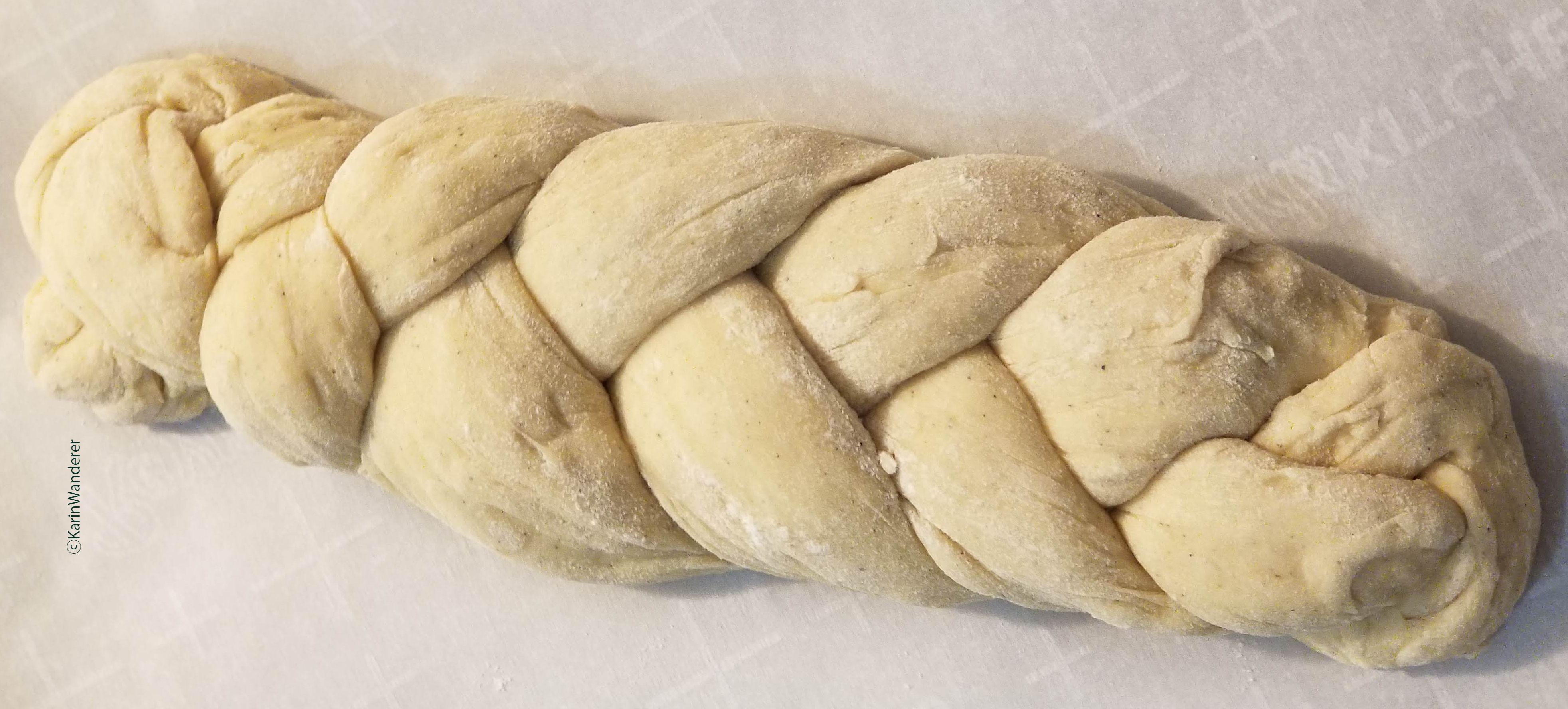 Unbaked braided loaf of bulle.