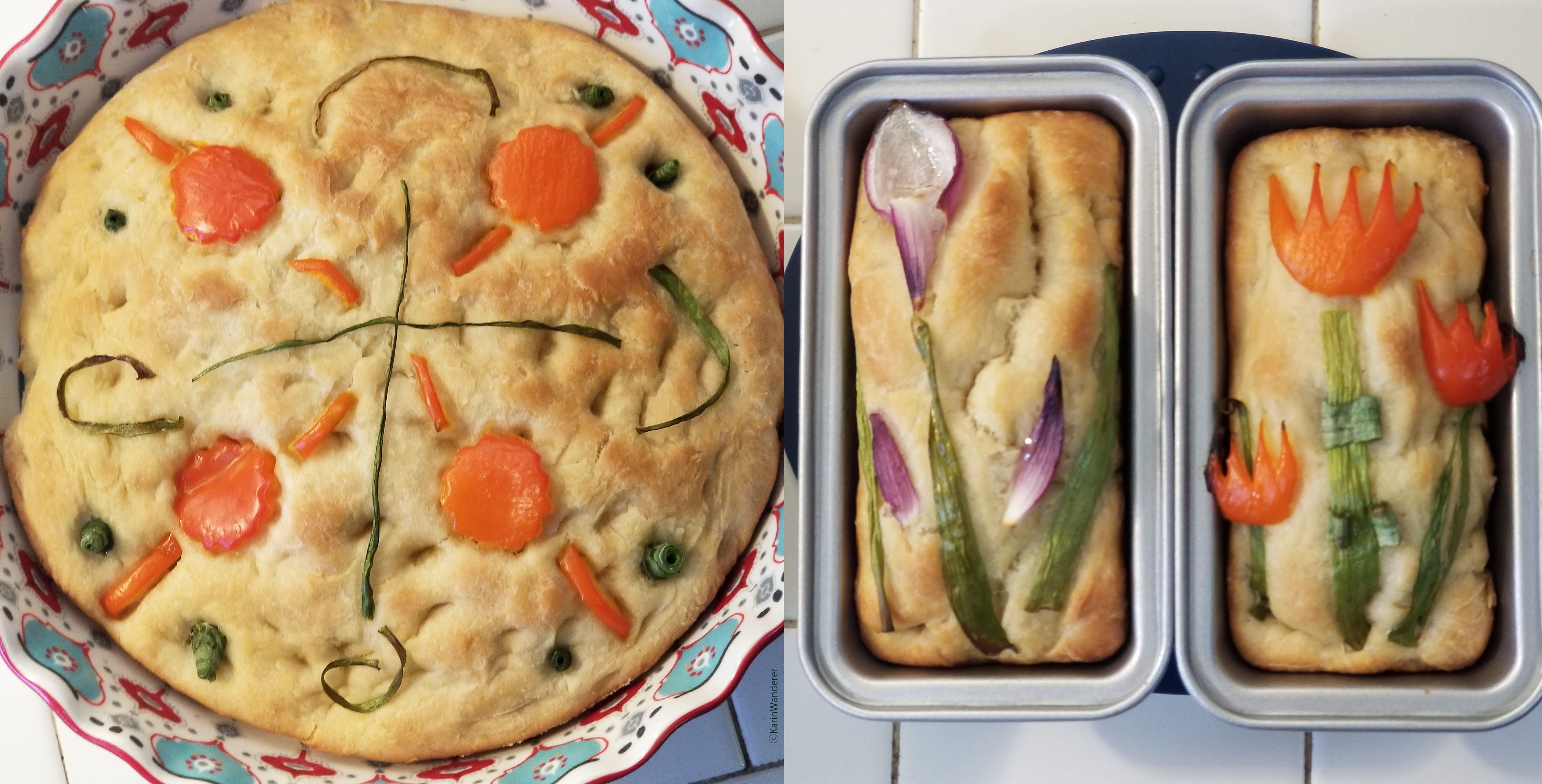 Photo of 3 loaves of focaccia, baked to golden brown. Loaf 1: circular loaf with a simple mandala made from green onions & red peppers. Loaf 2: small rectangular loaf using red & green onions to look like irises. Loaf 3 : small rectangular loaf using red peppers & green onions to look like tulips.
